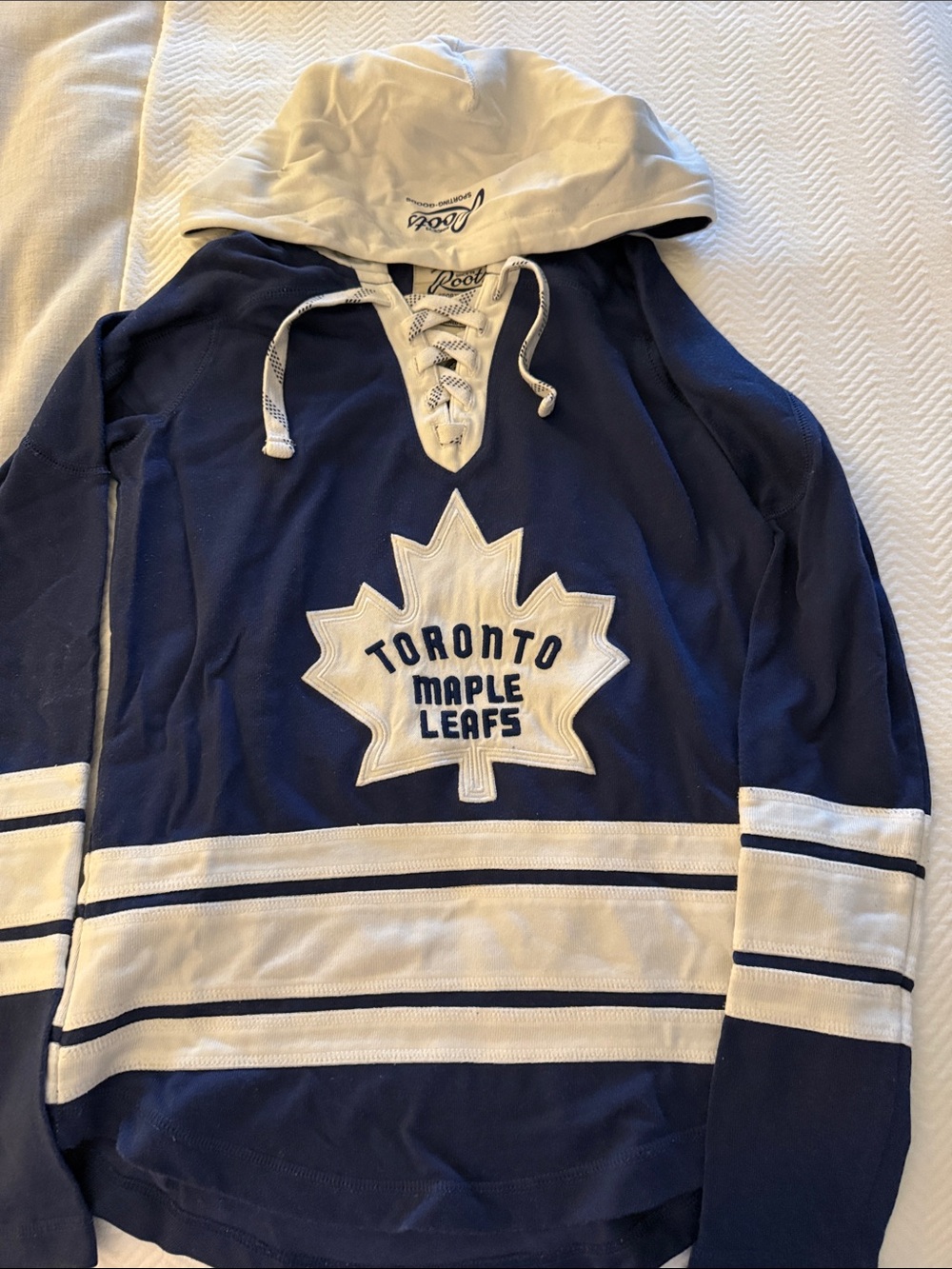 Roots Leaf’s Navy and White V-Neck Hockey Sweater